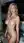 Curvy blonde nude by villa pool