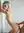 Faye nude against white wall