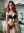 Redhead standing confident in kitchen