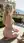 Young adult nude on terrace
