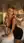College blonde leans over bed