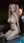 Young adult tongue out nude kneel