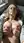 Curvy blonde squeezes her tits
