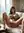 Legs spread nude on couch