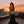 Maribel in black evening dress at sunset