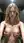 Young adult blonde topless in locker room