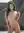 Young adult nude beach pose