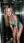 Blonde bends forward in elevator