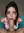 Yui in athletic wear on turquoise towel