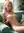 Young adult nude on teal couch