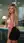 Curvy blonde in crop top pencil skirt office over-shoulder