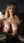 Curvy blonde lifting bare tits