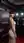 Brunette red carpet gown over shoulder pose