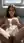 College brunette spreads on bed