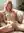 Nude on living room couch