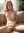 Early 20s pink hair fingering on couch