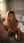 Nude blonde on knees in bedroom