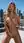 Young adult blonde rooftop nude