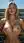 Blonde waves under outdoor shower