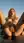 Nude blonde fingers on rooftop