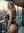 Curvy blonde bends over balcony