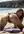 Latina doggy pose on beach