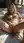 Curvy blonde fingers herself in bed