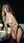 Curvy blonde fingers herself in mirror