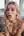 Topless blonde on couch titfuck