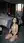 Brunette waves kneeling hotel carpet