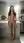 Nude vitiligo woman in kitchen