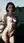 Redhead nude on city rooftop