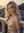 Blonde in sequin dress on balcony
