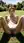 Nude brunette fingers in garden