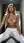 Blonde squatting wet in hallway